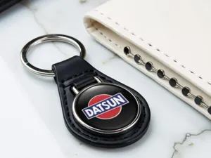 Datsun Porte-clés Cuir Dôme Qualité Sup Design Course